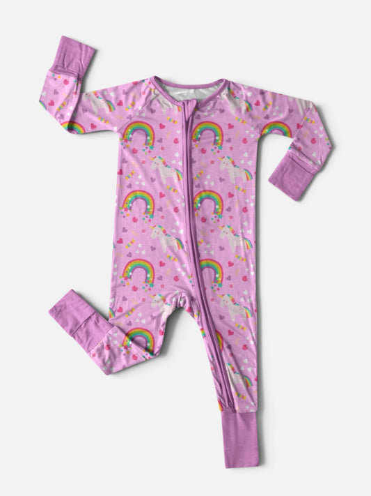 Polly & Pearl girls pink bamboo zip-up sleeper with colorful unicorns, rainbows, hearts, two-way zipper and pink cuffs
