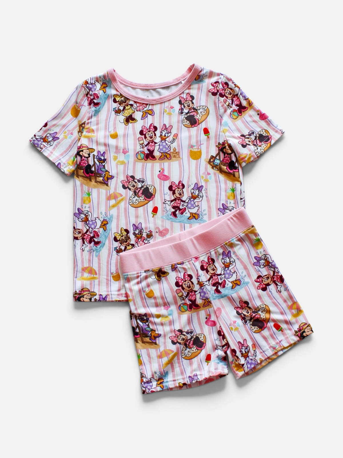 A two-piece bamboo children's pajama set featuring a short-sleeve top and matching shorts with a colorful cartoon print of Mouse and white vertical stripes, set against a light background 