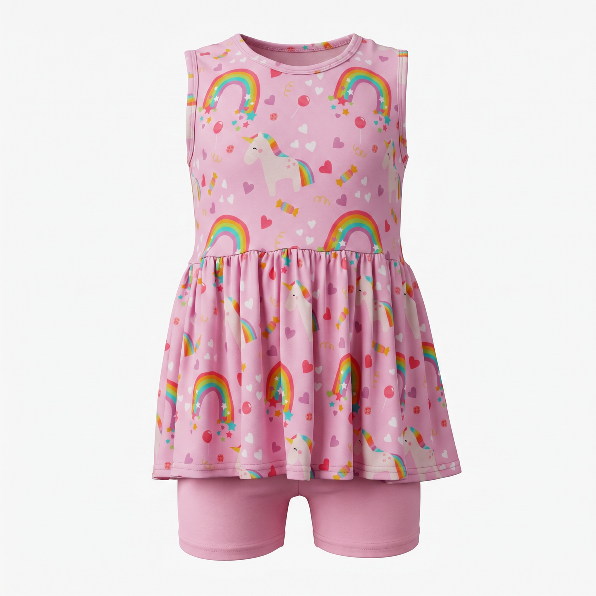 A sleeveless pink children's bamboo viscose peplum top, featuring an all-over print of rainbows, unicorns, and hearts, paired with matching pink shorts, shown on a plain light gray background.