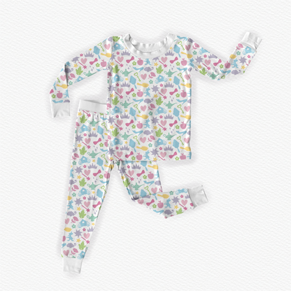 Polly & Pearl girls bamboo pajamas with pastel princess print, long sleeve top, matching pants and white ribbed cuffs