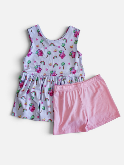 Polly & Pearl girls' two-piece summer set with a lavender palm tree print tunic and solid pink elastic waist shorts.