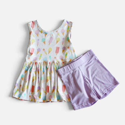 Polly & Pearl girls sleeveless drop-waist tunic with ice cream print and matching solid lavender bike shorts set
